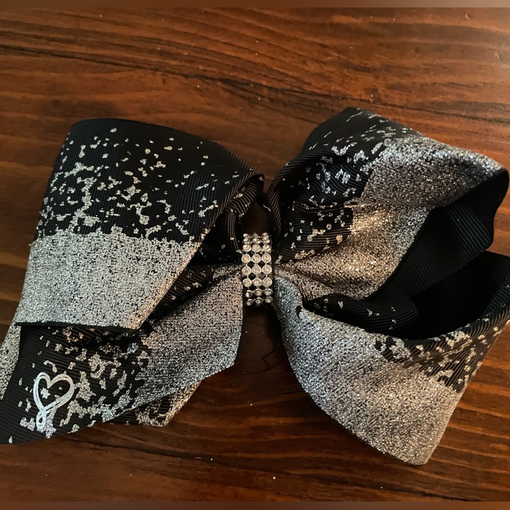 Jojo Siwa  signature collection Black and Siver Sparke Bow pony tail holder.
